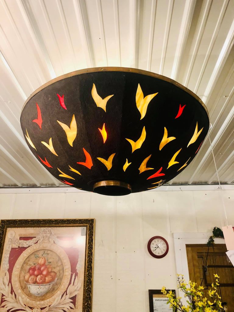 Vintage decorative ceiling light fixture inside Highway Pickers Antique Mall flea market in Cullman Alabama