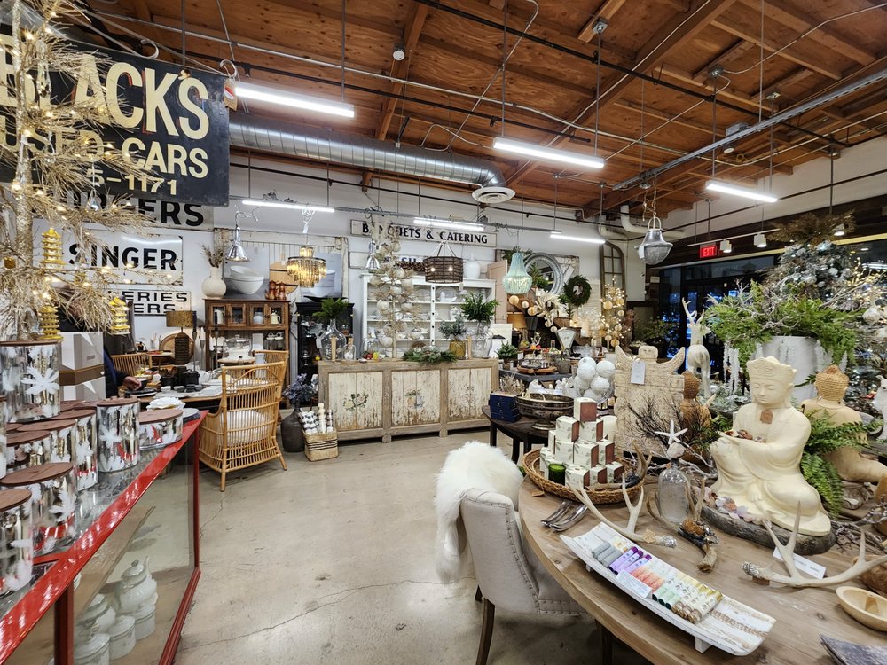 Interior of The Agoura Antique Mart in Whizin Market Square, Agoura Hills, showcasing vintage furniture and antique décor displays.