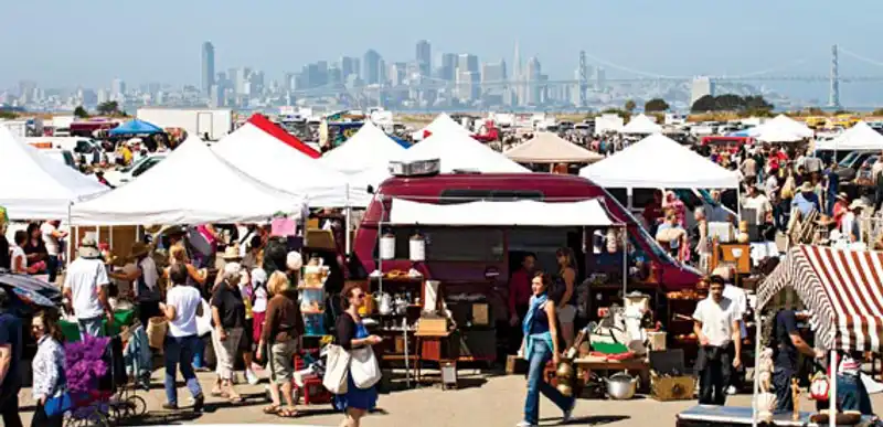 Wide view of vendors and shoppers at the Alameda Point Antiques Faire, Northern California’s largest outdoor antique market