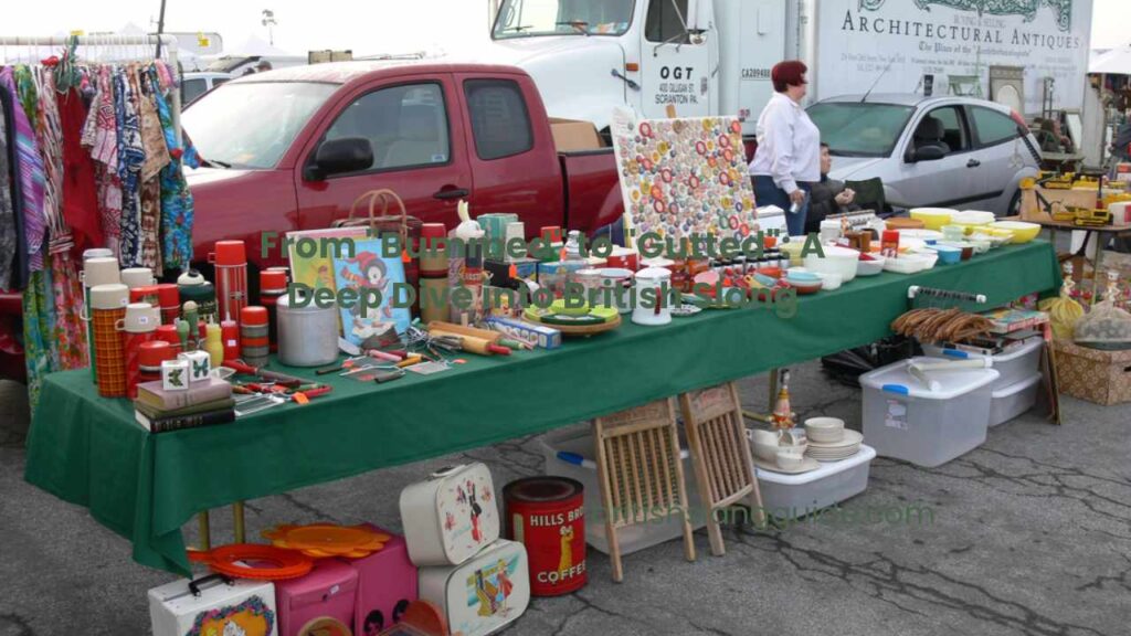 Vendors displaying vintage furniture, collectibles, and textiles at the Alameda Point Antiques Faire outdoor market in Alameda, California