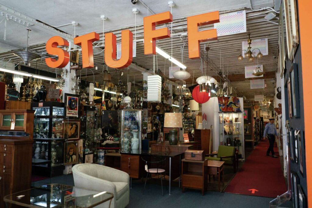 nterior view of Stuff by Luxe vintage collective in San Francisco with mid-century furniture, art, and décor displays