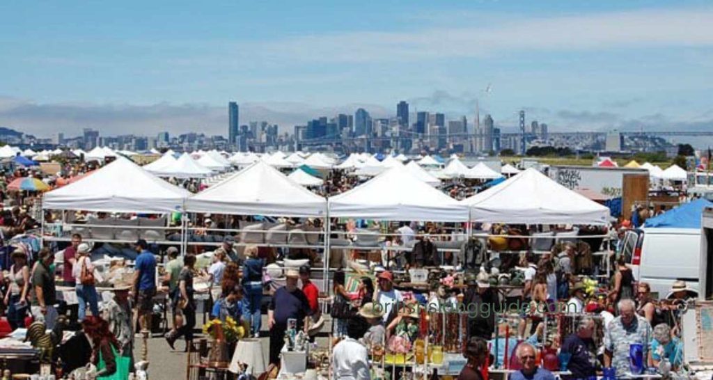 Alameda Point Antiques Faire vendors selling vintage furniture and antiques in Alameda California