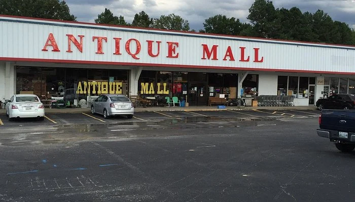 Exterior view of McKenzie Antique Mall in McKenzie, Tennessee showing the main entrance and large antique shopping center.